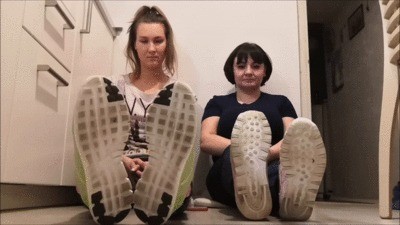 Tall And Petite Demonstrate Off Their Shoes Socks And Barefeet