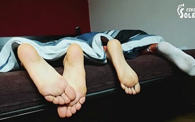 Two Women’ Morning Feet In Bed