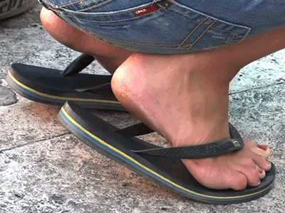 Candid Tourist Feet In Spin Flops